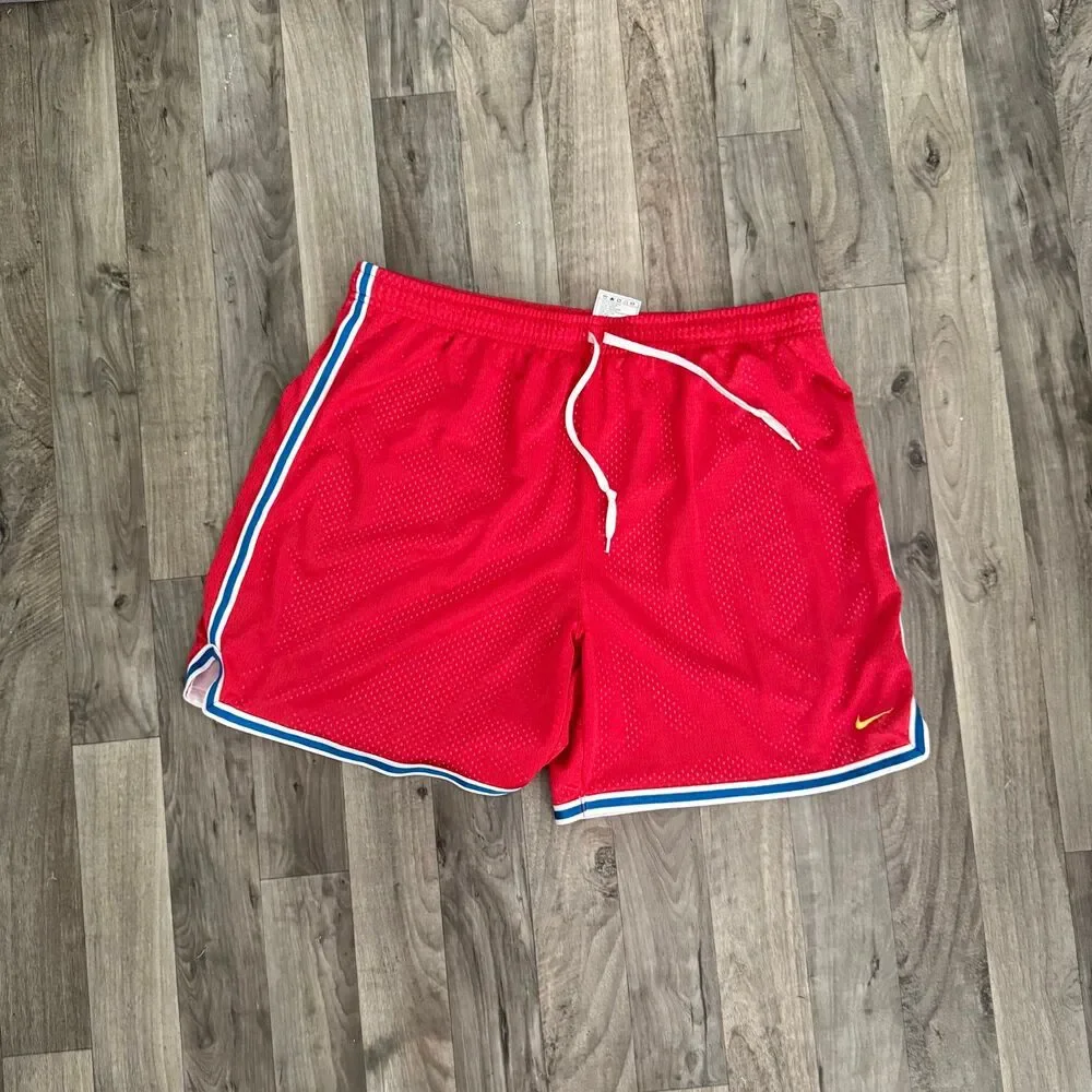 Vintage retro Nike red mesh shorts with blue piping